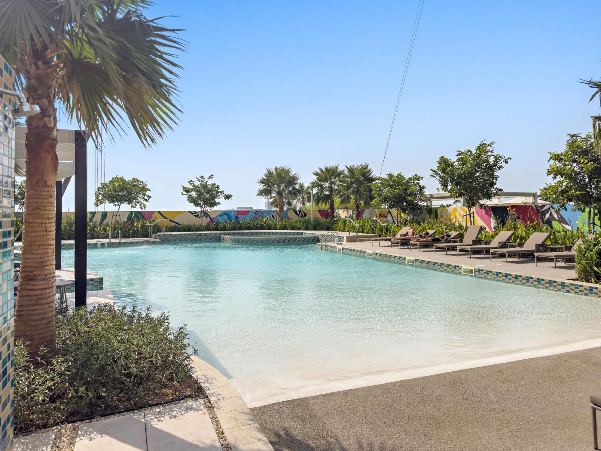Lush With Pool & Water Canal Views Apartment